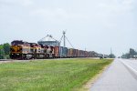 A southbound KCS train passes through the small town of Beasley, Texas